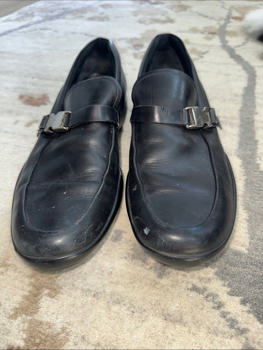 Prada Black Leather Slip-On Loafers with Metal Accent